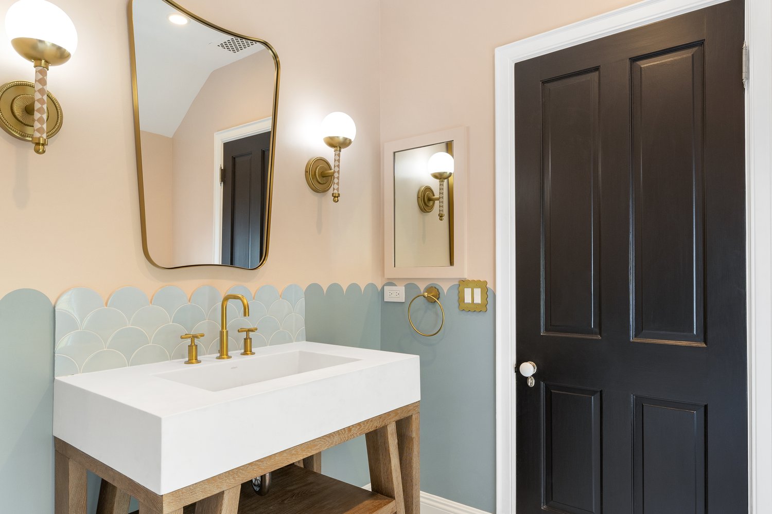 Scalloped tile and a painted bathroom door