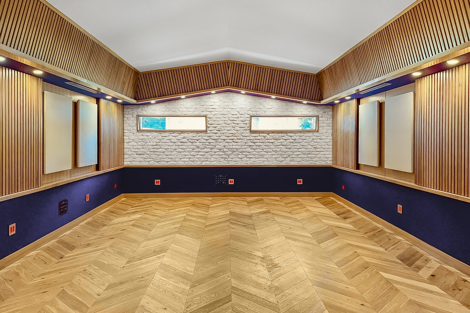 Live room with wood slat walls